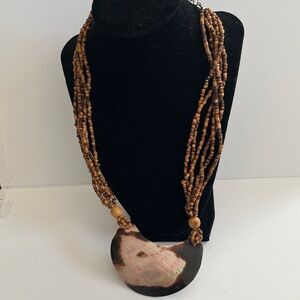 Brown Beaded Necklace with Shell Pendant